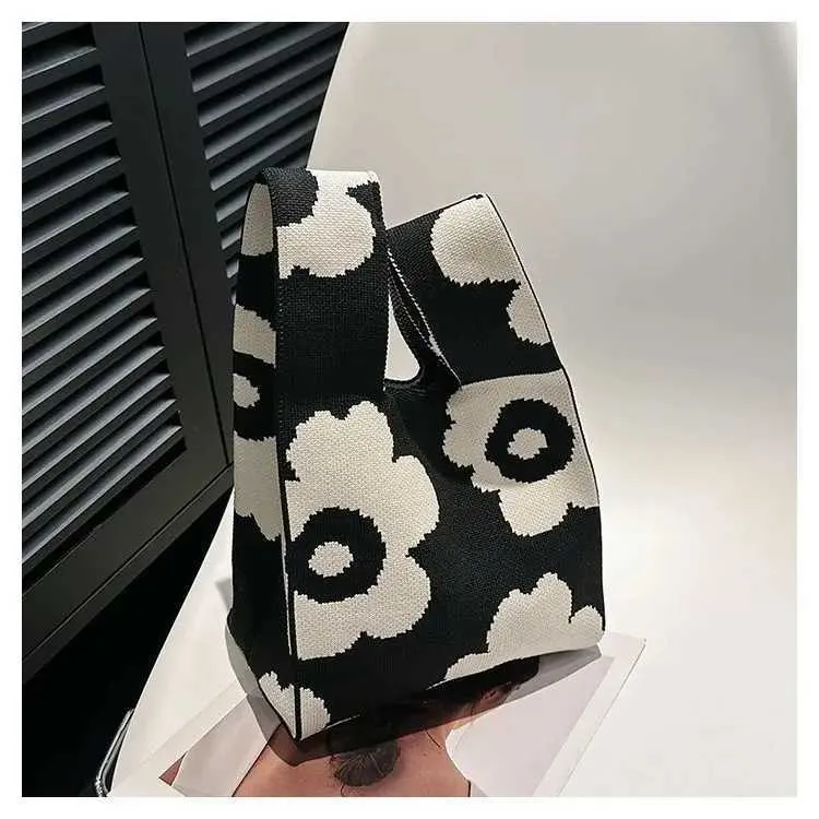 Borsa a mano in tela artistica giapponese di grande capacità, modello Geely, portafoglio con nodo casual e borsa da polso alla moda e versatile Wens_voghion.com