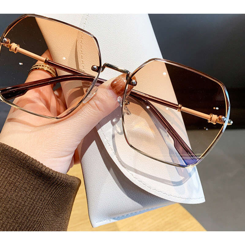 Lunettes de soleil de conduite fines et anti-ultraviolets pour femmes, tendance, haut de gamme, sans monture, à bords coupés_voghion.com