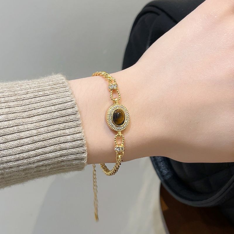 Dames Bracs Maillard Tiger Eye Stone voor dames Nieuwe herfst en winter High-end licht niche design Franse retro_voghion.com