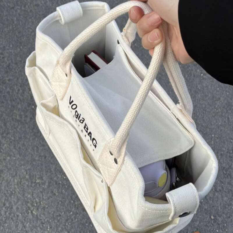 2025 Neue große Kapazität Outdoor Pet Leichte Mama Baby Canvas Damen Tragetasche_voghion.com