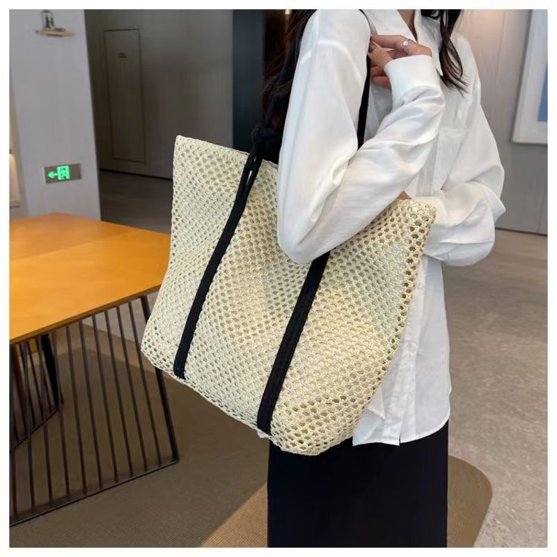Aushöhlen Papierseil große Kapazität Mode Schnalle einzelne Schulter Gras gewebte Damen Tasche Strandtasche_voghion.com