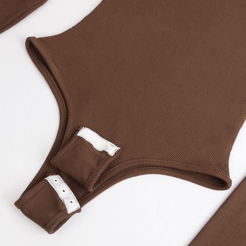 Tuta a maniche lunghe con collo alto e fondo a camicia da donna autunno e inverno_voghion.com