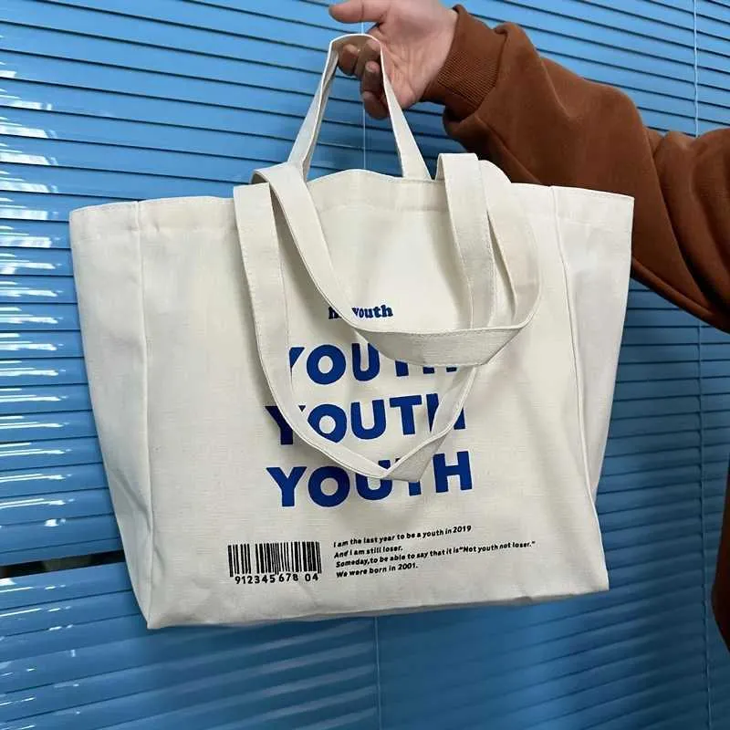 Large capacity retro letter printed canvas handbag with foldable design - perfect for casual shopping and daily use_voghion.com