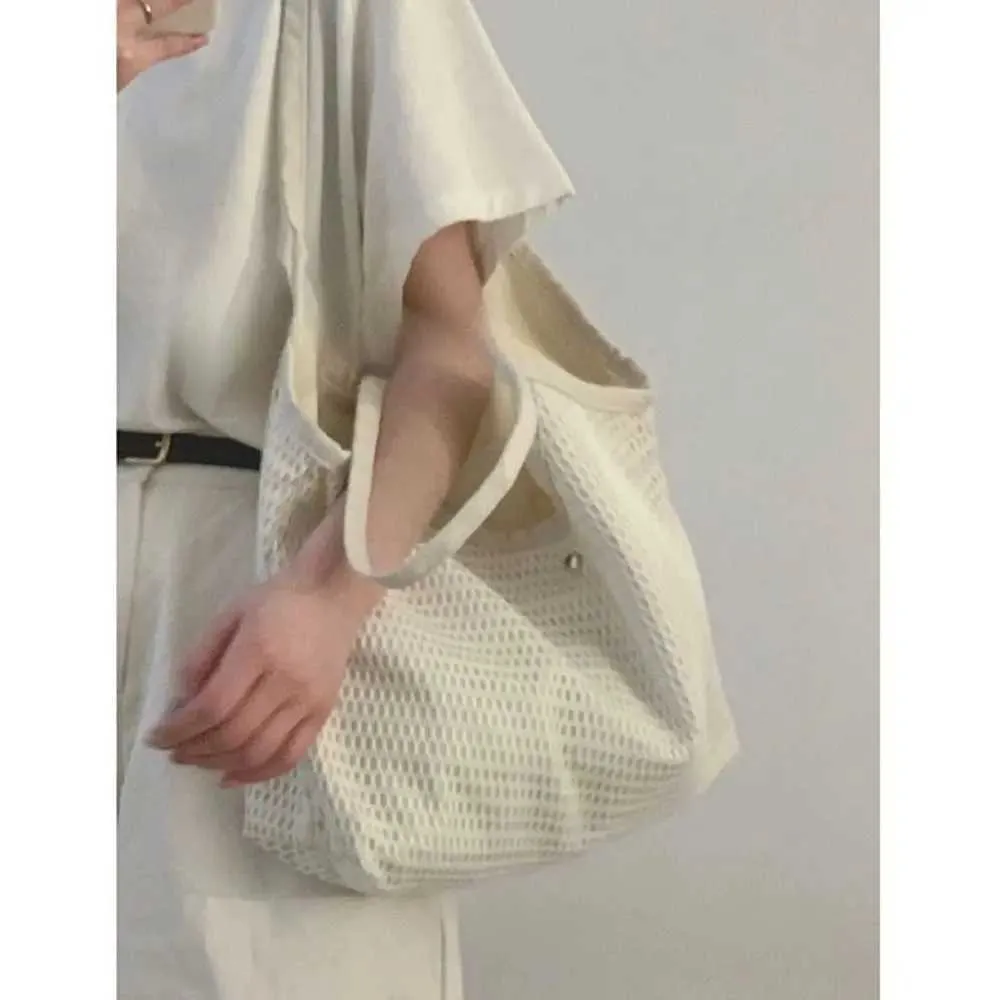 Solid color fabric large capacity beach canvas shoulder womens simple shopping bag Y241011_voghion.com