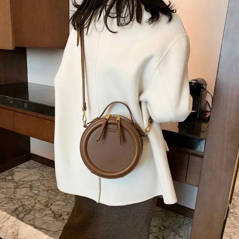 Sac à bandoulière de couleur unie pour petit sac à main rond pour femmes, sacs de créateurs de mode, sac à bandoulière en cuir, fermeture éclair pour femmes_voghion.com