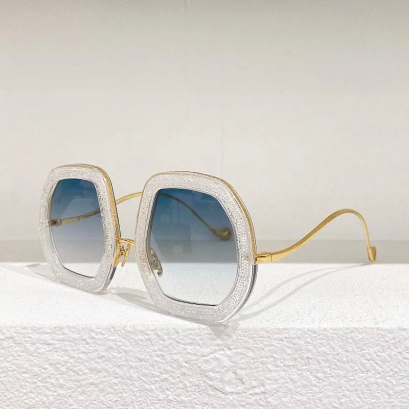 Designer Women's Round Sunglasses With Metal Temple Elements_voghion.com