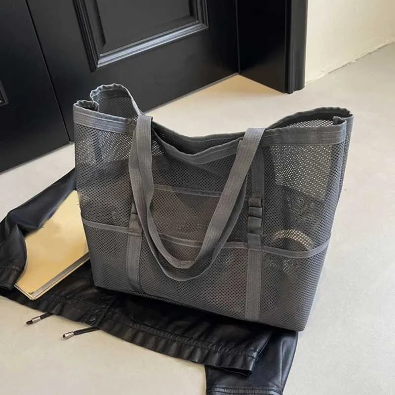 Hollow large capacity makeup storage womens multifunctional mesh shoulder travel transparent beach bag Y241011_voghion.com