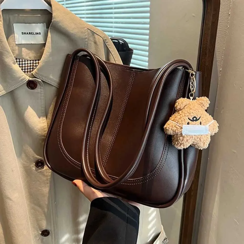 Bolso de hombro de alta gama con textura de gran capacidad, nuevo bolso de mano para mujer, otoño e invierno 2024, C241106_voghion.com