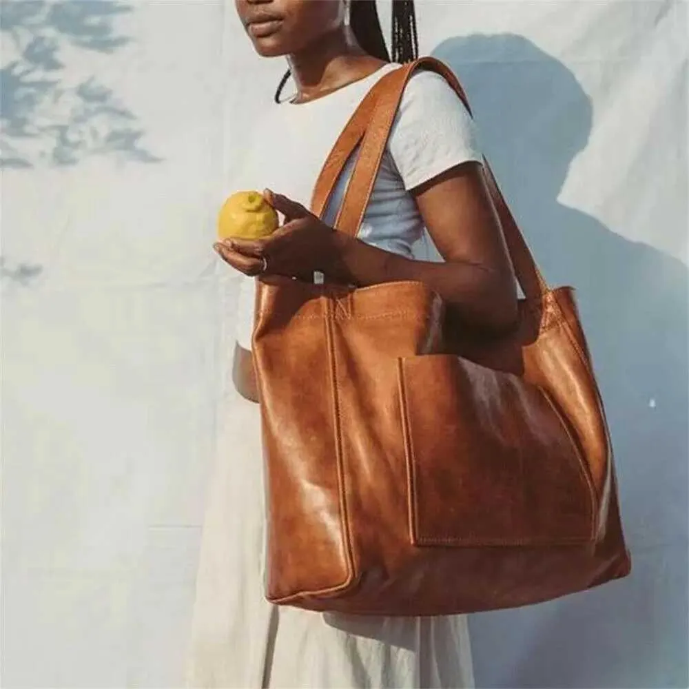 Womens super portable travel shoulder bag top handle soft leather handbag Y241123_voghion.com