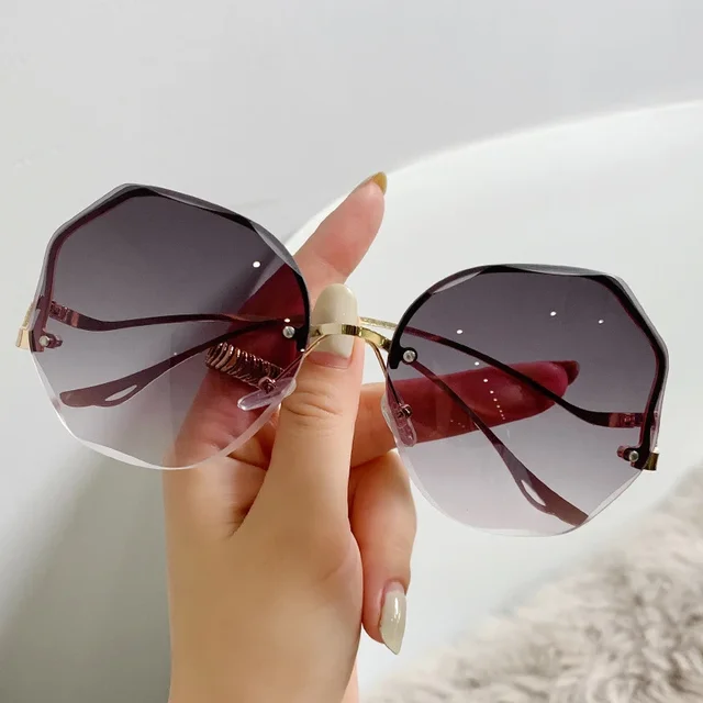 Fashion 2024 Round Gradient Sunglasses Women Metal Curved Eyewear Ocean Rimless Fashion Sun Glasses Ladies UV400 Oculos De So_voghion.com