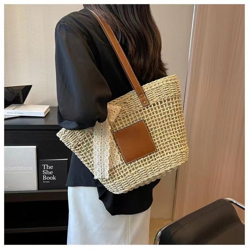 hollow shoulder new simple straw woven holiday style beach versatile women's bag_voghion.com