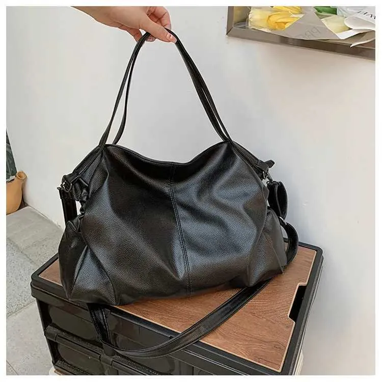 Large black shoulder large homeless shopping solid color high-quality leather cross body handbag womens travel bag_voghion.com