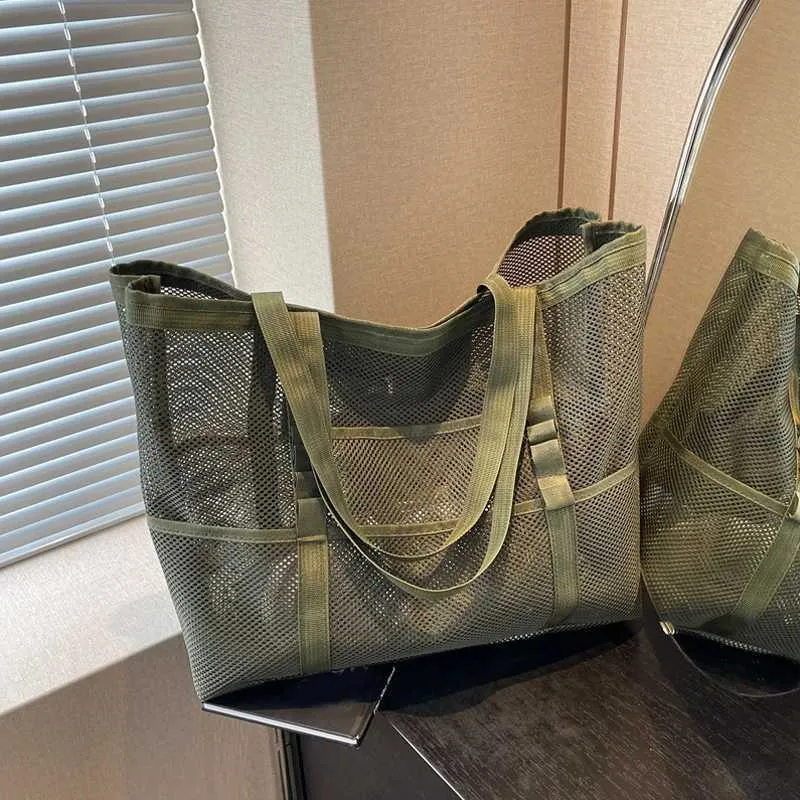 Bolsa de praia transparente de viagem de ombro de malha multifuncional feminina de grande capacidade de armazenamento de maquiagem Y241011_voghion.com