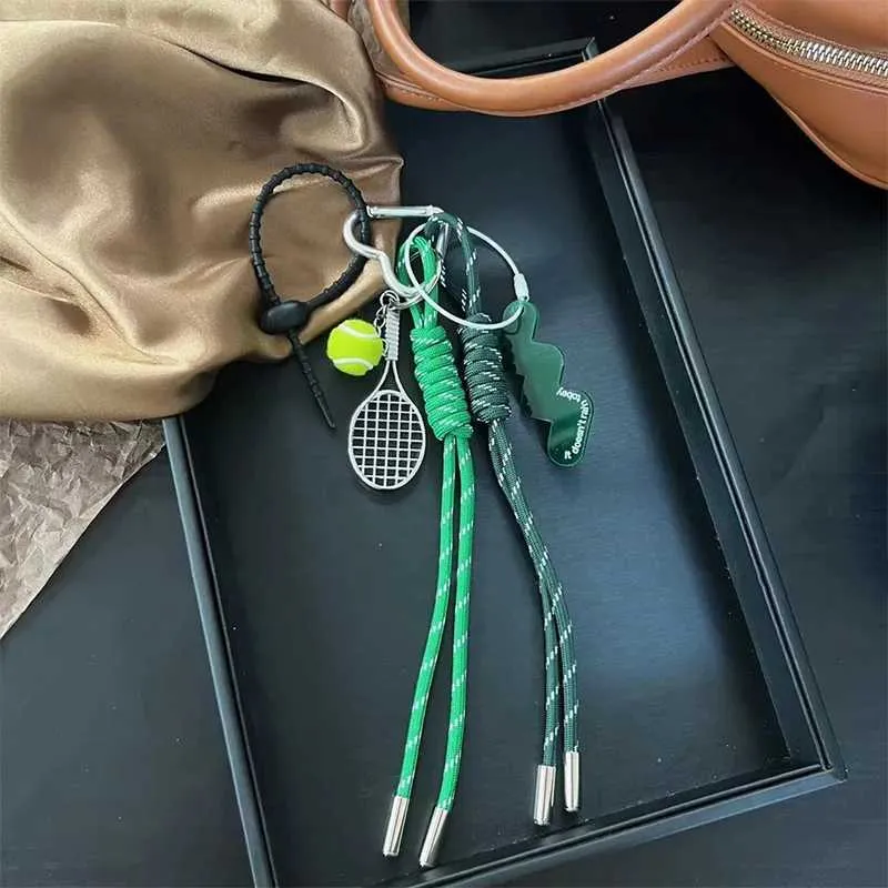 Breloque de poche en forme de saucisse tissée Pendentif composite polyvalent Accessoire de sac pour téléphone portable Corde de suspension décorative Y241121_voghion.com