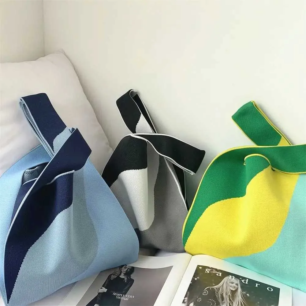 Geely pattern handmade high-capacity knitted wrist bag handbag Y241106_voghion.com