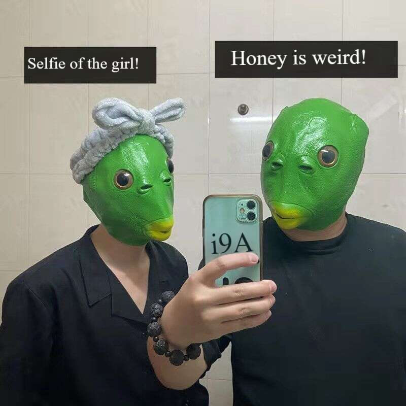 Sculptură în nisip a unui om-pește Monstru online Ancoră celebră amuzantă cu cap verde Mască de spectacol_voghion.com