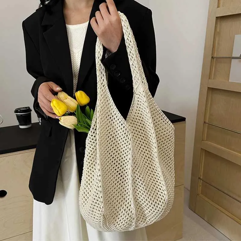 Womens crochet handbag mesh beach large capacity fashionable knitted shoulder solid color simple shopping bag Y241011_voghion.com
