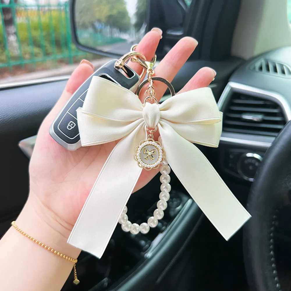 Y2K Band Bowknot Perlen Anhänger Charm Schlüsselanhänger Elegantes Perlenarmband Schlüsselanhänger Süße Kette Handy Schlüsseltasche Behänge_voghion.com