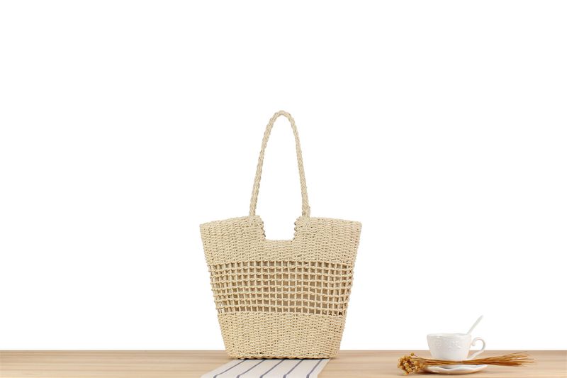 Gewebte Tasche aus Papierseil, neue französische Nischen-Hohlgewebetasche, eine Schulter, handgehaltene Strandtasche mit_voghion.com