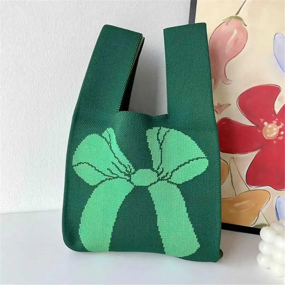 Gebreide shopper met strik, handgemaakte tas voor dames_voghion.com