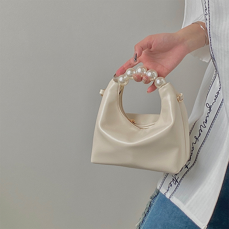 Petit sac à bandoulière de niche pour femmes avec un design de perles fraîches 2024 avec un sens de la chaîne et un sac à boulettes à main_voghion.com