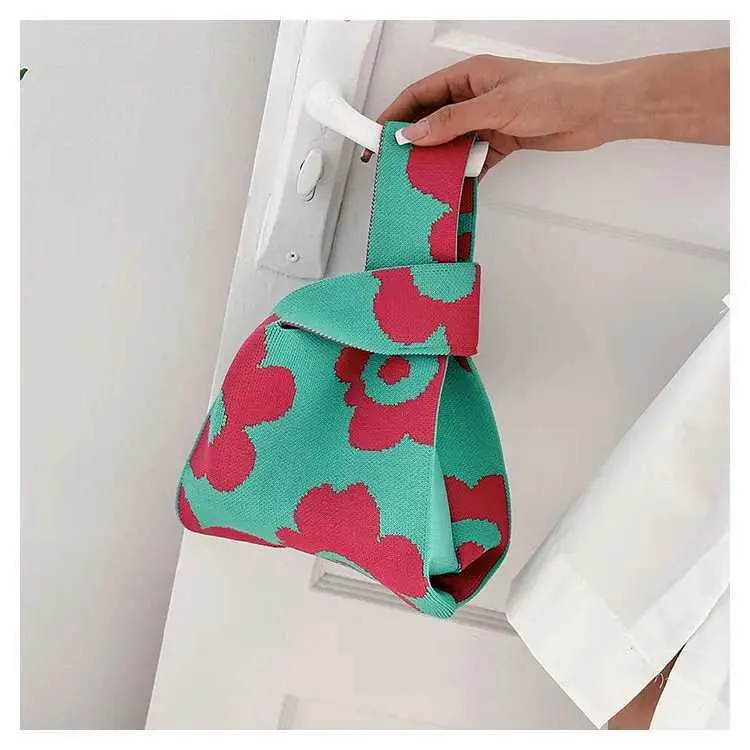 Borsa a mano in tela artistica giapponese di grande capacità, modello Geely, portafoglio con nodo casual e borsa da polso alla moda e versatile Wens_voghion.com