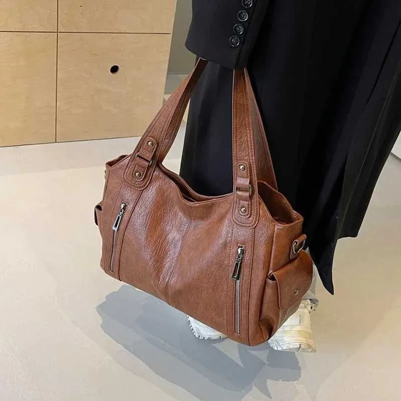Sacs à bandoulière à compartiment intérieur souple 2024 de haute qualité aux couleurs contrastées pour femmes Mode Fermeture éclair Pu Femmes_voghion.com