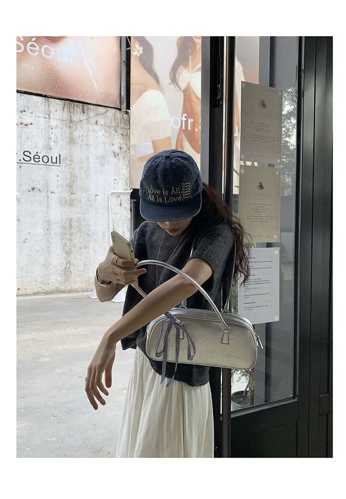 2024 Estate coreana Nuovo design di nicchia Borsa da donna portatile in stile balletto Tendenza moda Borsa versatile in argento con tracolla singola_voghion.com