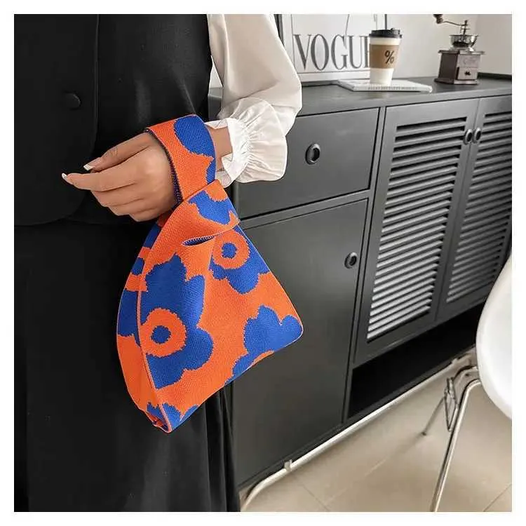 Borsa a mano in tela artistica giapponese di grande capacità, modello Geely, portafoglio con nodo casual e borsa da polso alla moda e versatile Wens_voghion.com