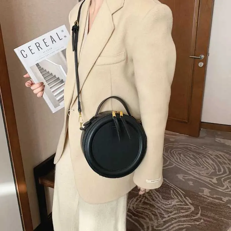 Sac à bandoulière de couleur unie pour petit sac à main rond pour femmes, sacs de créateurs de mode, sac à bandoulière en cuir, fermeture éclair pour femmes_voghion.com