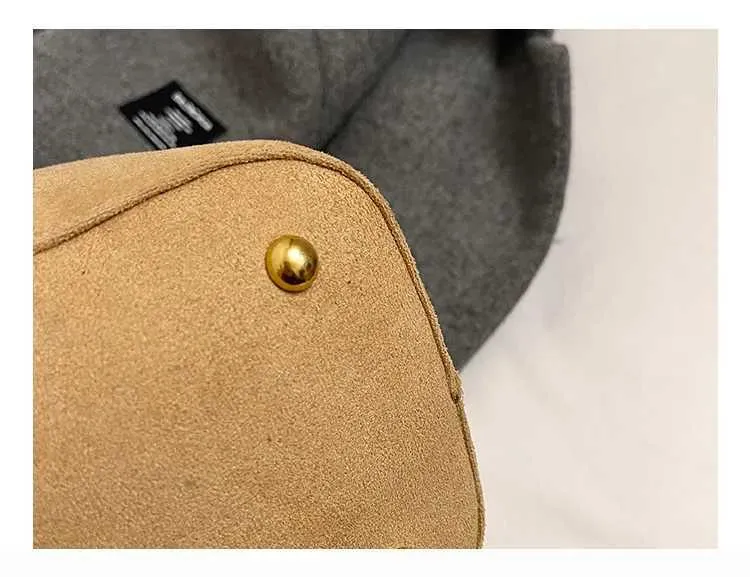 Borsa a secchiello vintage in scamosciato a contrasto tracolla_voghion.com