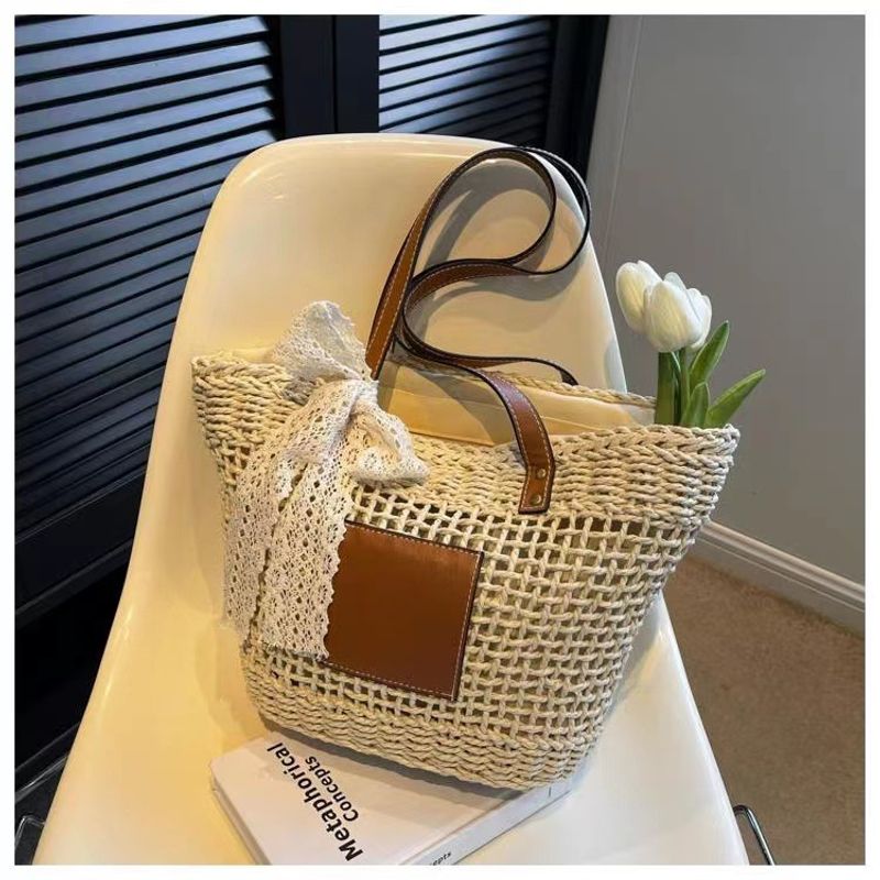 hollow shoulder new simple straw woven holiday style beach versatile women's bag_voghion.com