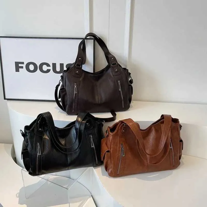 Sacs à bandoulière à compartiment intérieur souple 2024 de haute qualité aux couleurs contrastées pour femmes Mode Fermeture éclair Pu Femmes_voghion.com