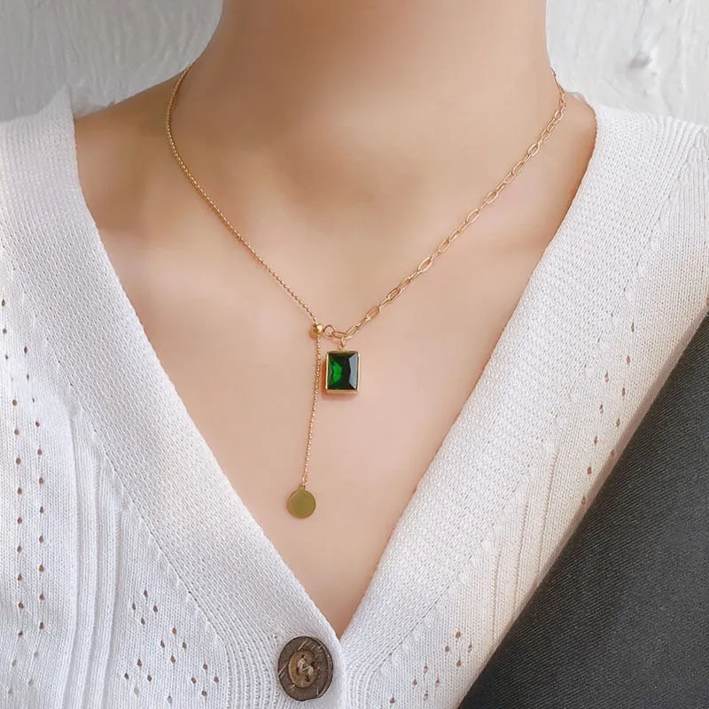 Collier pendentif zircon vert croix chaîne acier titane femme_voghion.com