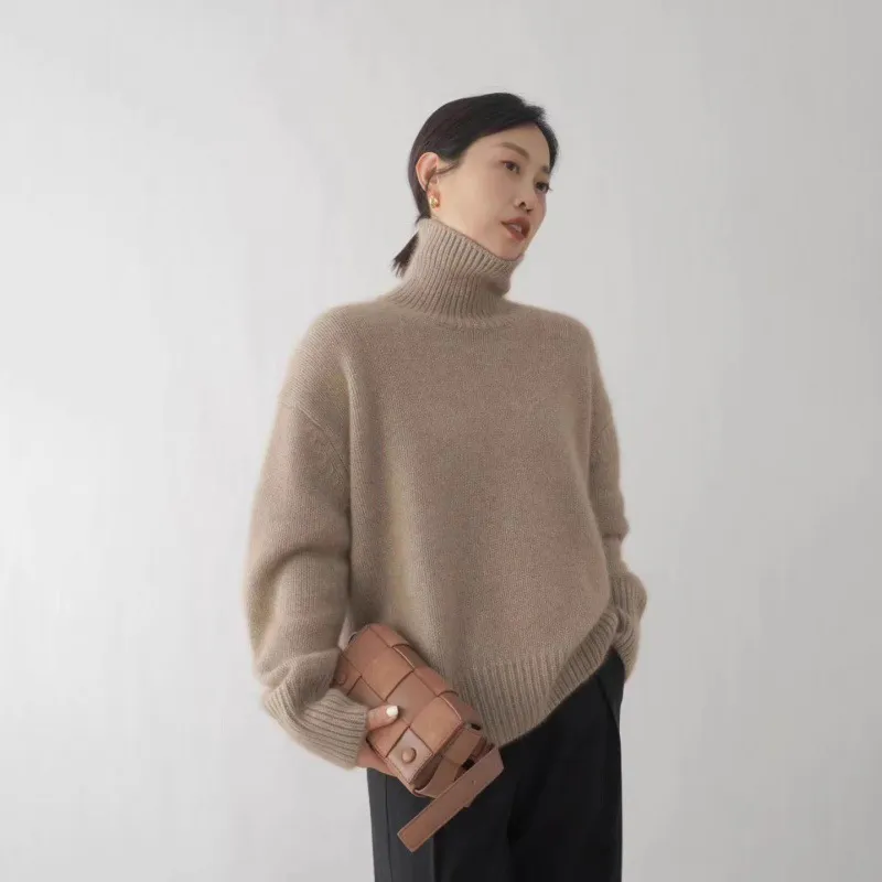 Pulls pour femmes Pull tricoté en cachemire pour femmes Élégant col haut Col roulé Lâche Épaissir Chaud Couleur unie_voghion.com