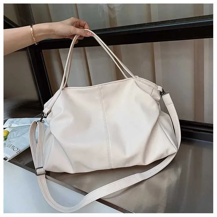 Large black shoulder large homeless shopping solid color high-quality leather cross body handbag womens travel bag_voghion.com