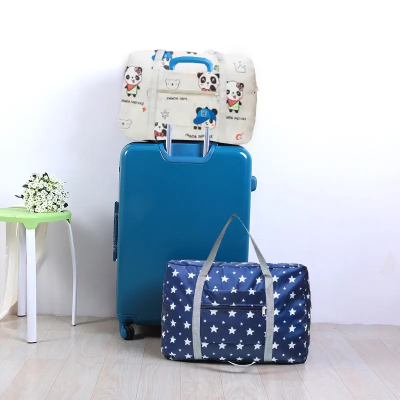 2023 neue Nylon Faltbare Unisex Große Kapazität Tasche Lage Frauen Wasserdichte Handtaschen Männer Reisetaschen_voghion.com