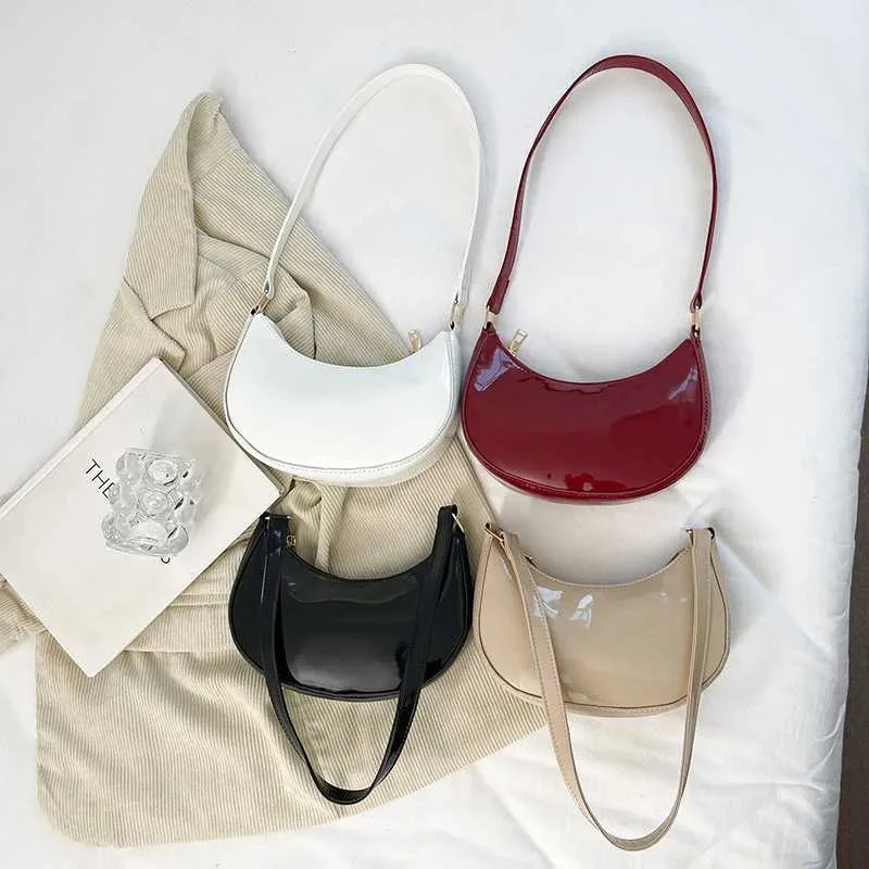 Designer Bag Fashionable new solid color bright textured light handheld zipper cross shaped bag Y241115_voghion.com