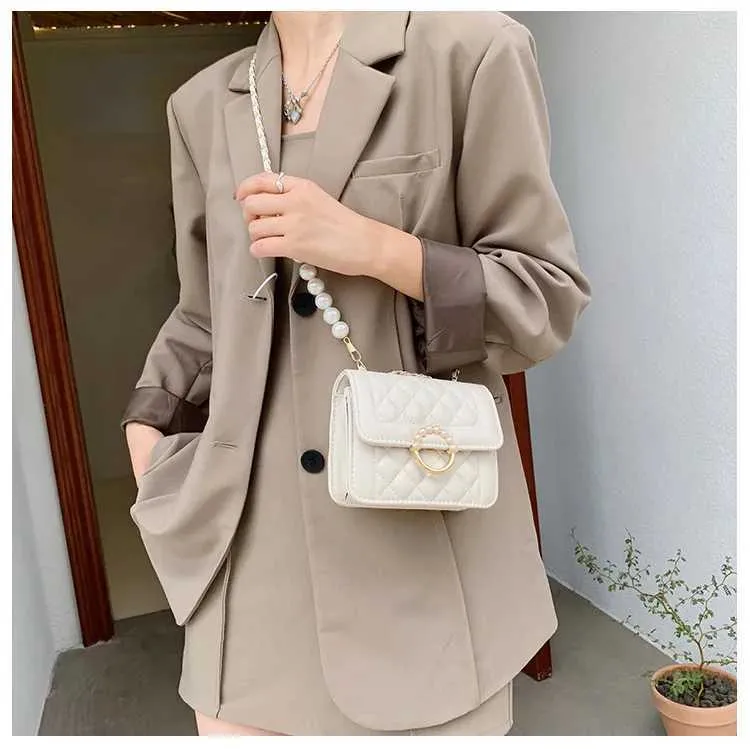 Borsa a spalla e tracolla elegante da donna con catena di perle_voghion.com