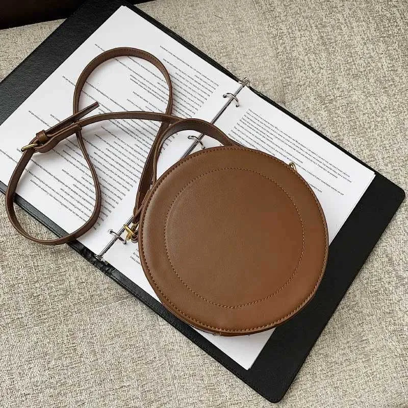 Sac à bandoulière de couleur unie pour petit sac à main rond pour femmes, sacs de créateurs de mode, sac à bandoulière en cuir, fermeture éclair pour femmes_voghion.com