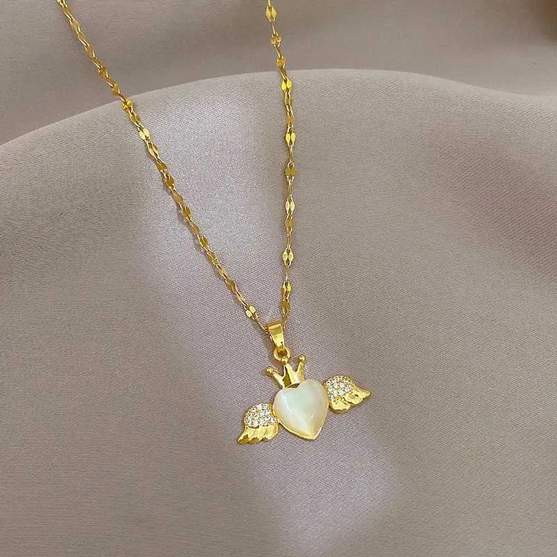 Collana girocollo con catena in acciaio inossidabile, ciondolo a forma di cuore con corona in stile gotico, colore oro, per donne_voghion.com