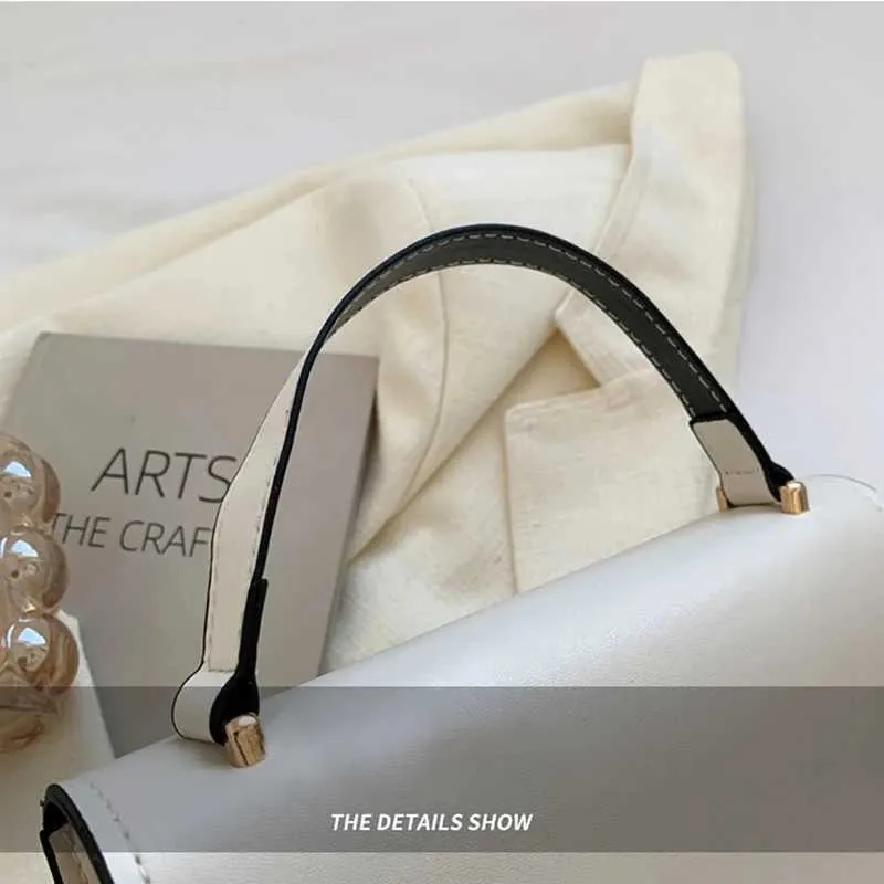 Kleine schoudertas voor dames van kunstleer met gespsluiting_voghion.com