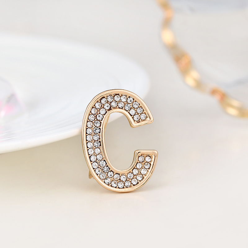 Spilla versatile con lettere inglesi in strass, stemma con fiore sul petto, luce antiscivolo, alla moda per uomo e donna_voghion.com
