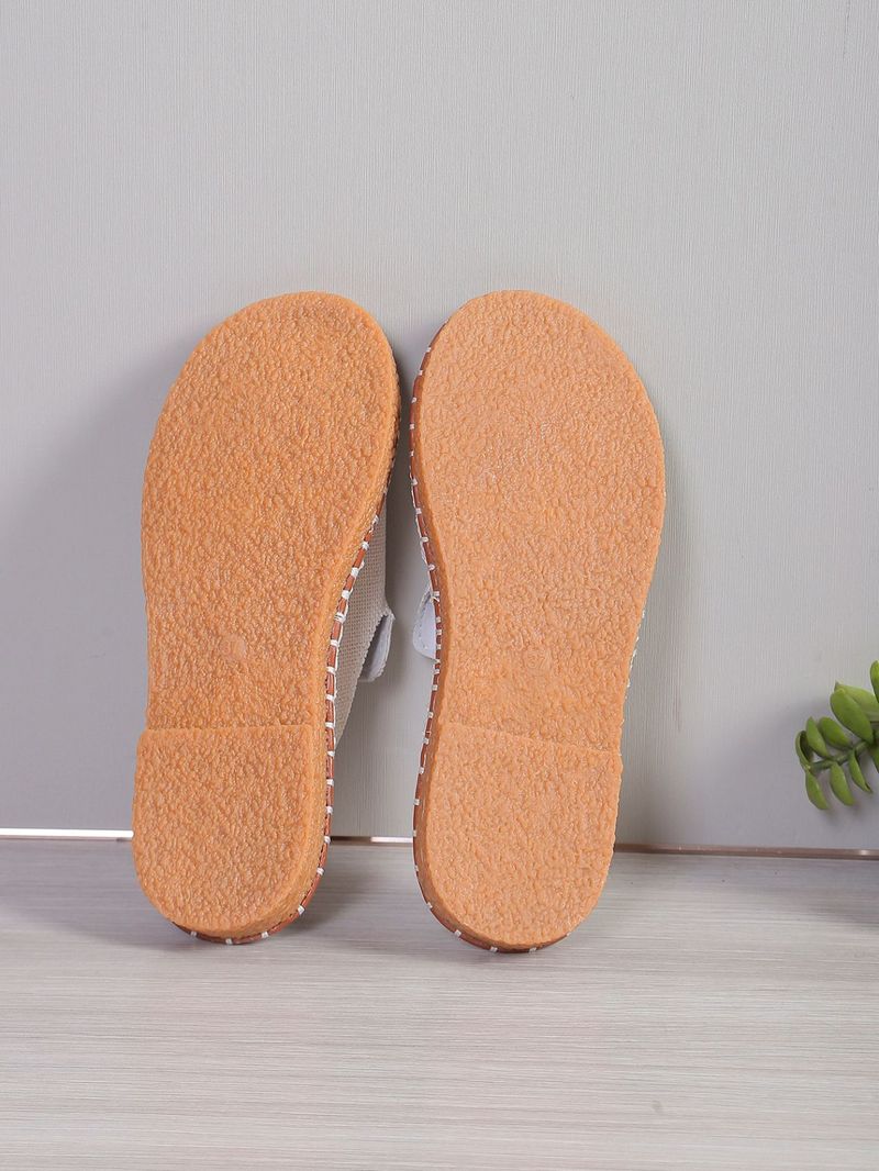 Pantofole da donna con punta aperta e nappe piatte alla moda_voghion.com