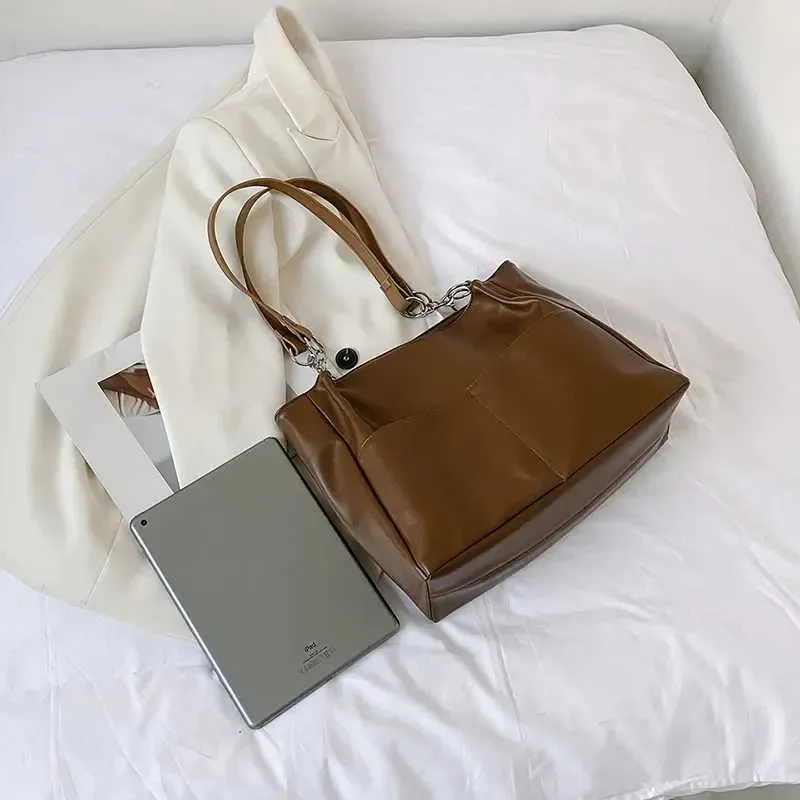Sacs à bandoulière pour femmes Vintage Couleur unie Simple Grande capacité Grand cuir PU Les derniers sacs à main de voyage_voghion.com