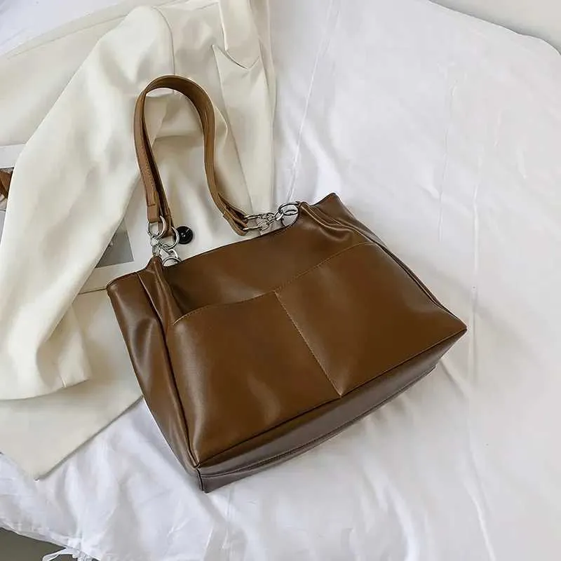 Sacs à bandoulière pour femmes Vintage Couleur unie Simple Grande capacité Grand cuir PU Les derniers sacs à main de voyage_voghion.com