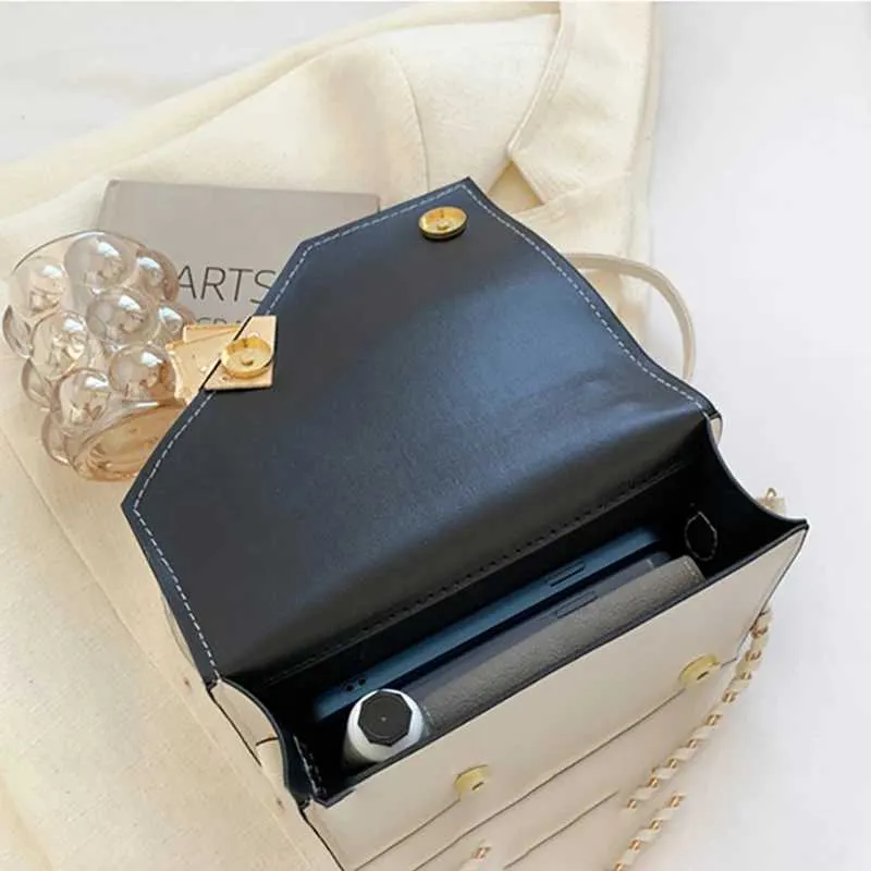 Kleine schoudertas voor dames van kunstleer met gespsluiting_voghion.com