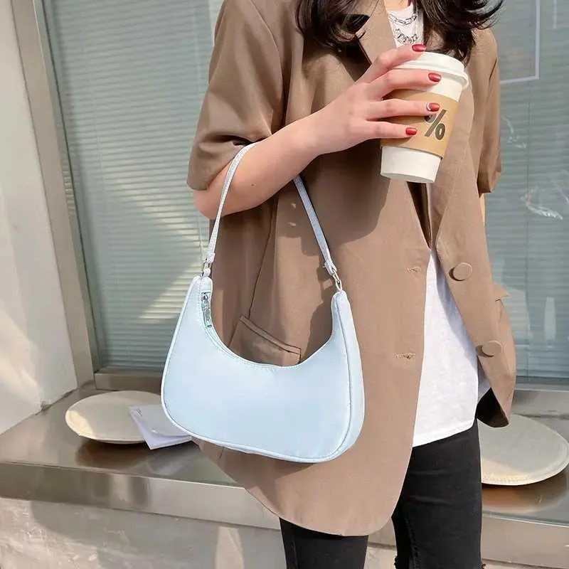 Wens Nyl Shoe 2023 Fi Solid Canvas Dumpg Unterarm Designer Tasche Cluh Geldbörse und Handtasche Y241026_voghion.com
