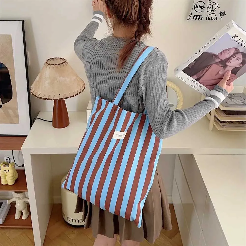 Vintage gestreifte warme Leinwand große Kapazität tägliche Einkaufstasche lässig tragbare Damen Reisehandtasche Y241109_voghion.com