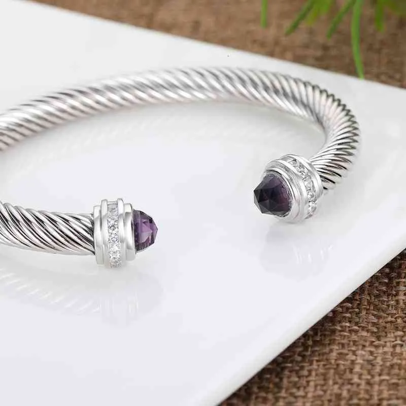 Flätat öppet armband för kvinnor och män design smycken mode_voghion.com